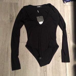 BRAND NEW solid black long sleeved body suit